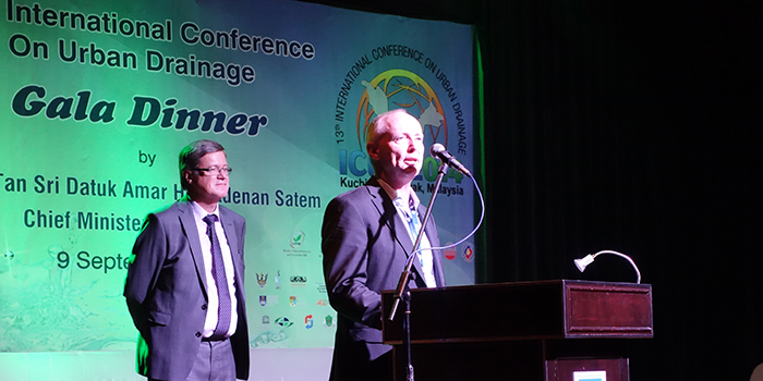 Peter Steen Mikkelsen at his acceptance speech during the ICUD gala dinner 9th September 2014, in front of the JCUD chair Prof. David Butler, Exeter University, UK.