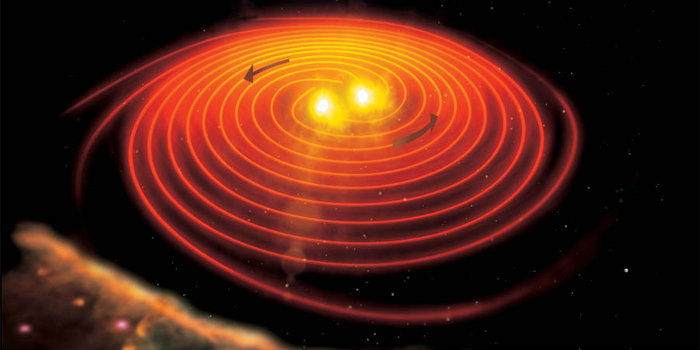 To neutronstjerner roterer om hinanden, støder sammen og bliver én under frigivelse af energi, der sender gravitationsbølger og gammastråling gennem rummet. (Illustration: ESA)