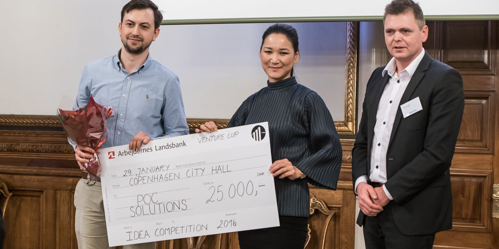 Dan Høgdall (left) from POC Solutions, Anna Mee Allerslev, Mayor of Employment and Integration in Copenhagen, and René Nørgaard, Director Arla Foods HOCO - Global Categories and Operations. Photo: Chris Linde.