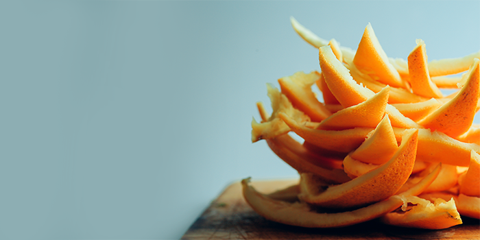 Orange peels on wooden table