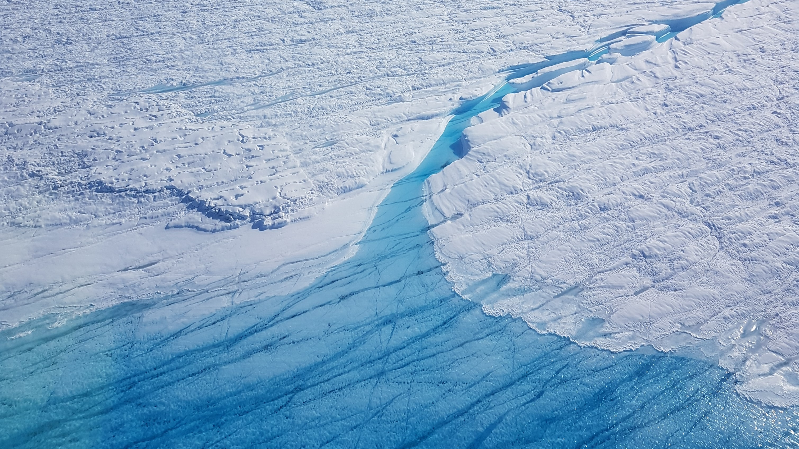 Lake and river on the Zachariae Glacier, northeast Greenland. Photo: Shfaqat Abbas Khan, DTU Space.
