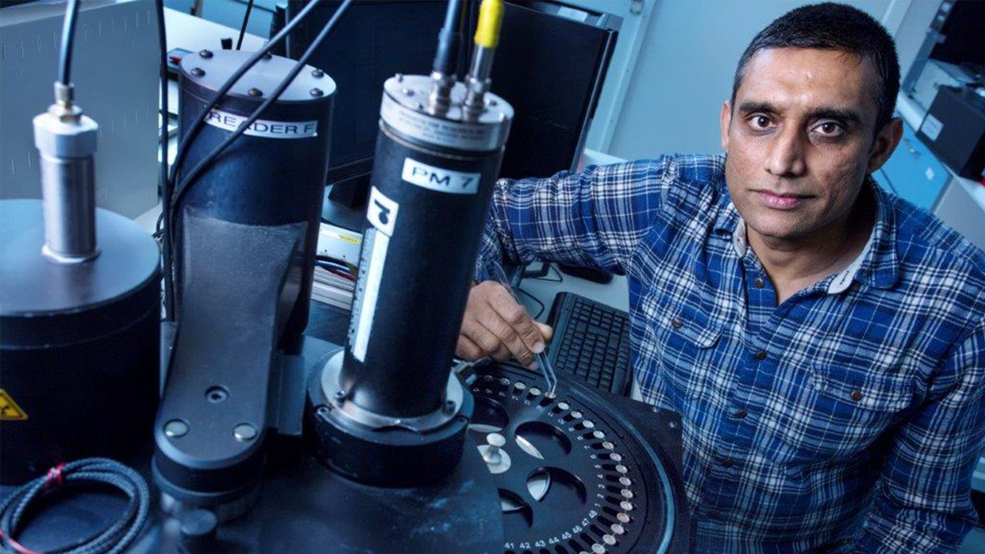 Man in laboratory.