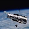 Ved hjælp af data fra rumteleskopet Hubble har forskere opdaget forstadiet til et sort hul i det tidlige univers. (Foto: NASA)
